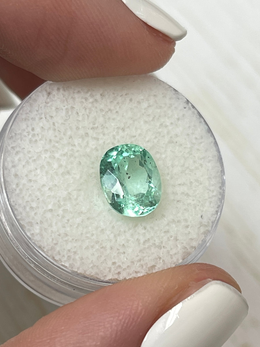 Stunning 9x7 Oval Colombian Emerald - 2.10 Carat in Distinctive Freckled Green
