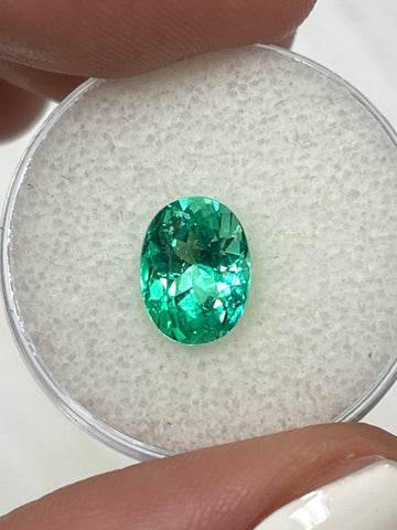 Oval-Cut Colombian Emerald: 2.29 Carat Yellowish Green Gemstone