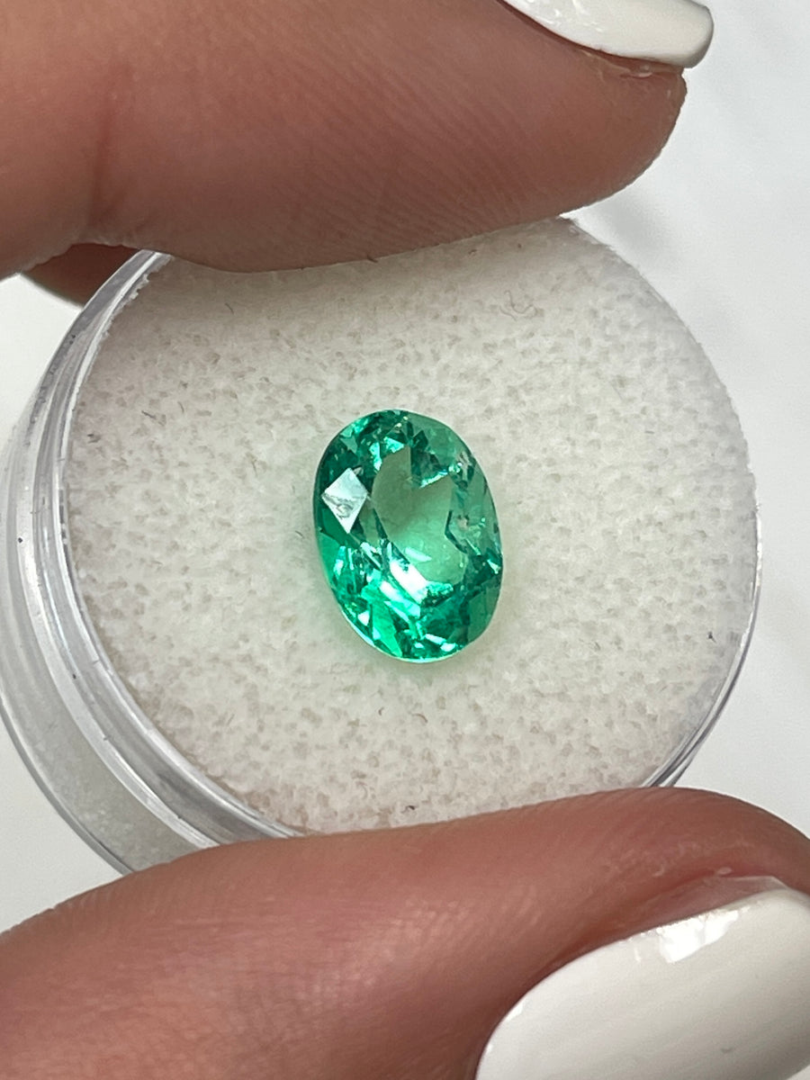 Natural Yellow-Green Loose Emerald: 2.29 Carat Oval Gemstone