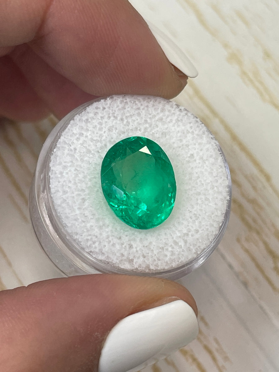 Natural Colombian Emerald - 6.89 Carat Oval Muzo Yellowish-Green Gemstone