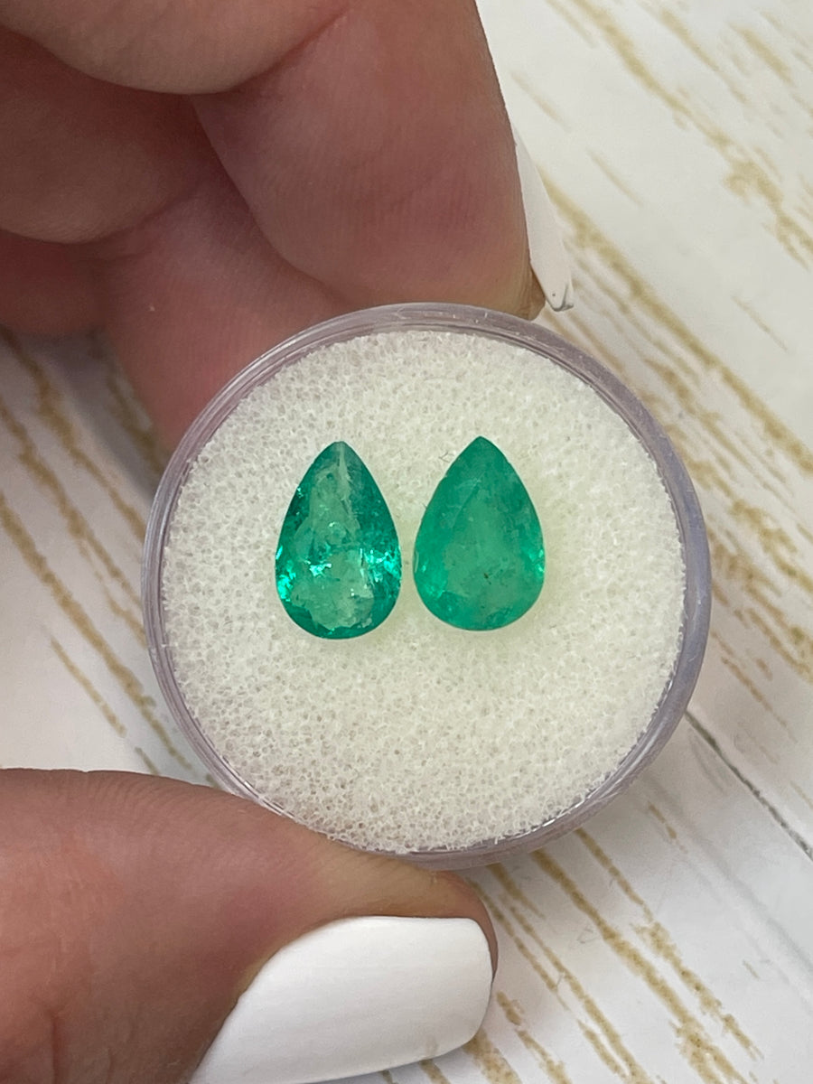 Pair of 2.73 Total Carat Weight Pear-Cut Colombian Emeralds in Earthy Hues
