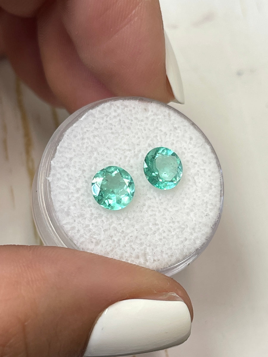 Matched Set of Bluish Green Colombian Emeralds, 1.68tcw, 6.6x6.6mm Each