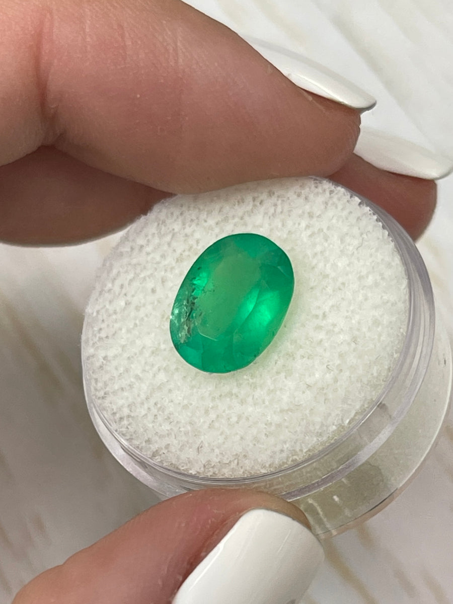 3.46 Carat Colombian Emerald with a Striking Oval Cut in Neon Green