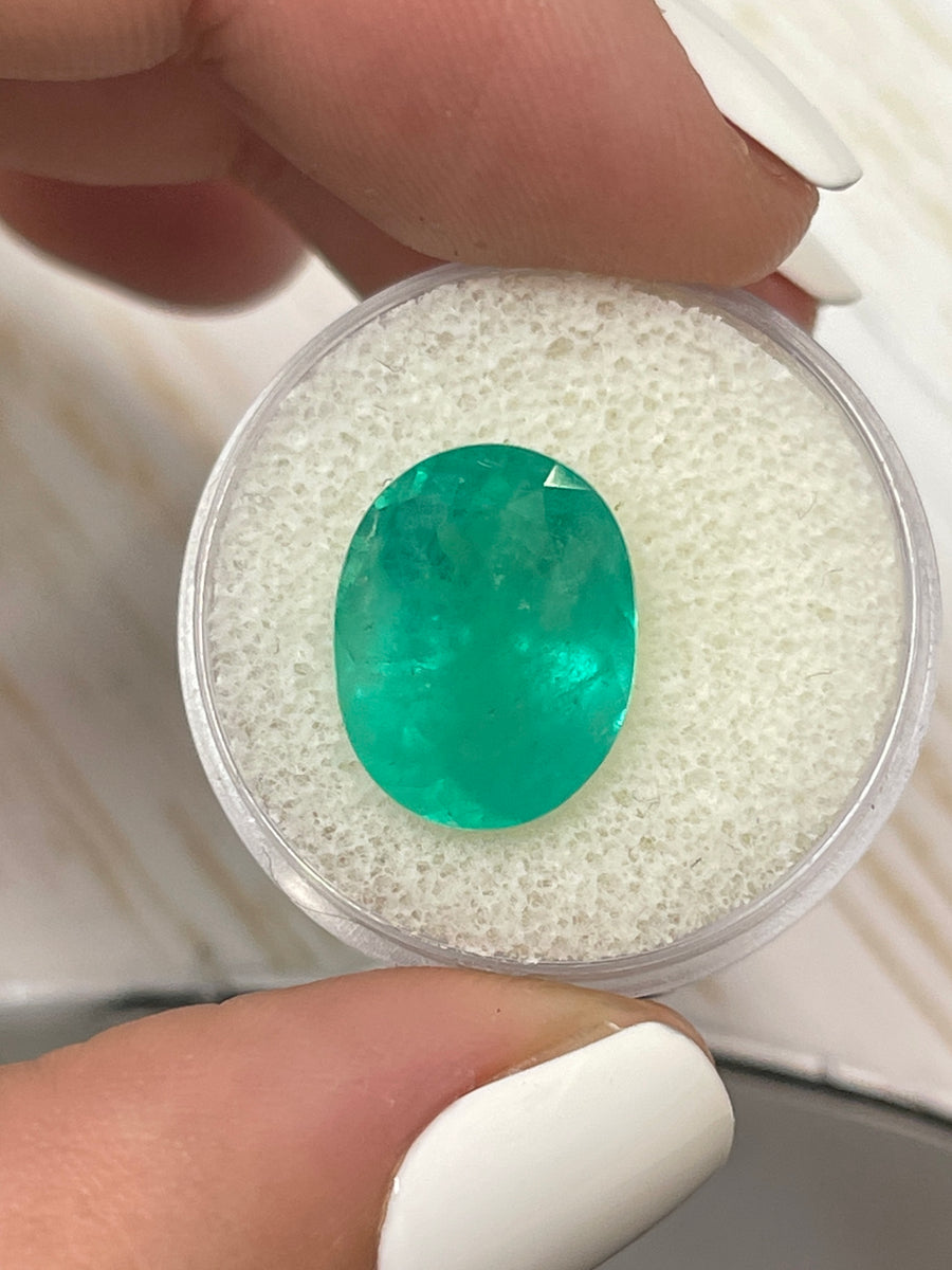 Oval Cut 8.10 Carat Colombian Emerald in Medium Bluish Green Hue