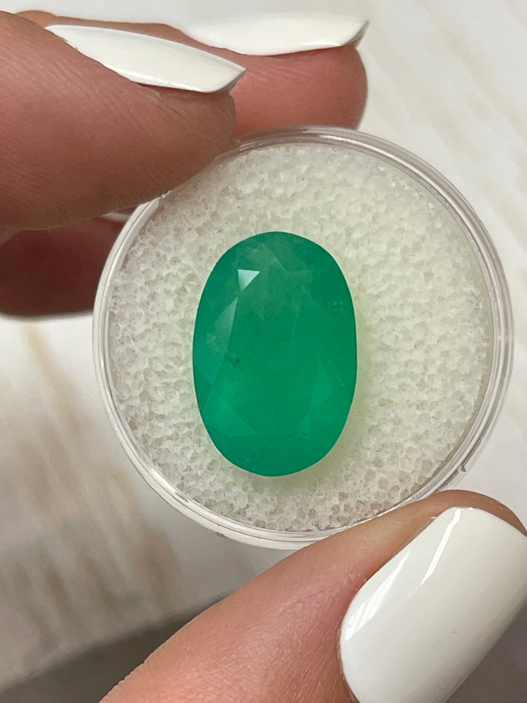 Stunning 8.85 Carat Grassy Green Colombian Emerald - Oval Gem