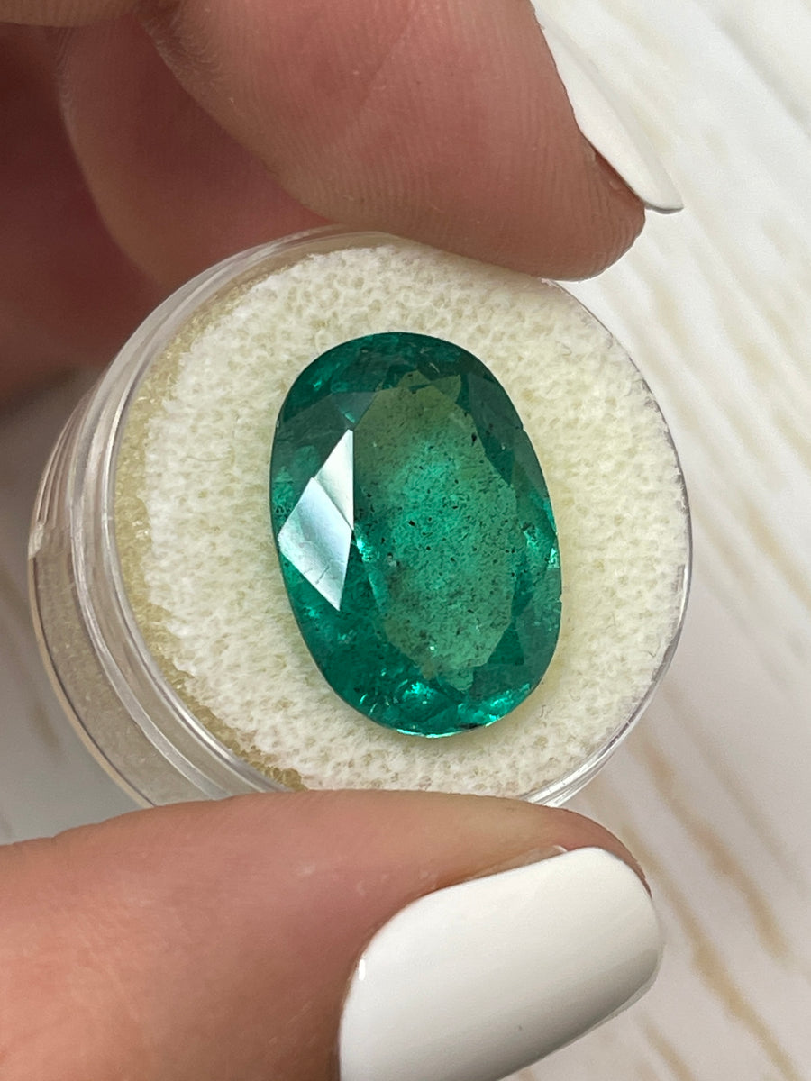 Freckled Colombian Emerald - 12.42 Carat Oval Gemstone in Deep Green