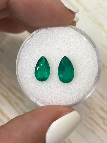 Pair of 2.04 Total Carat Weight Pear-Shaped Muzo Green Colombian Emeralds