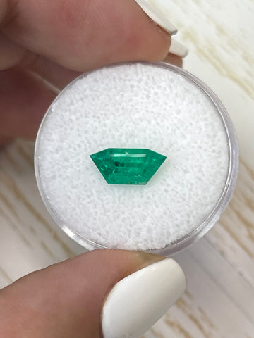 Distinctive Cut: 24 Carat Colombian Green Emerald, 11x5 Dimensions