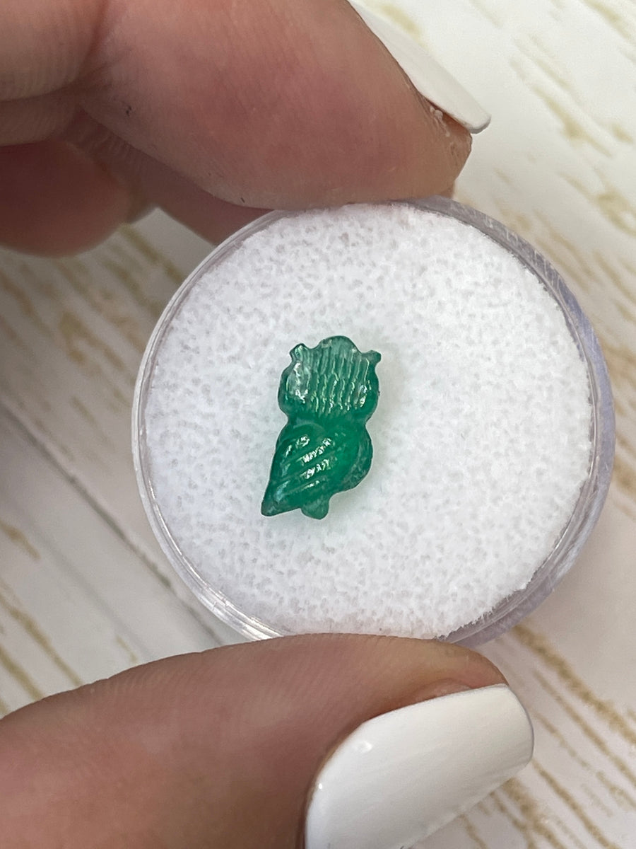 Owl Sculpture in Emerald, Meticulously Hand Carved, Sized 11mm x 6mm, and 1.79 Carats in Weight