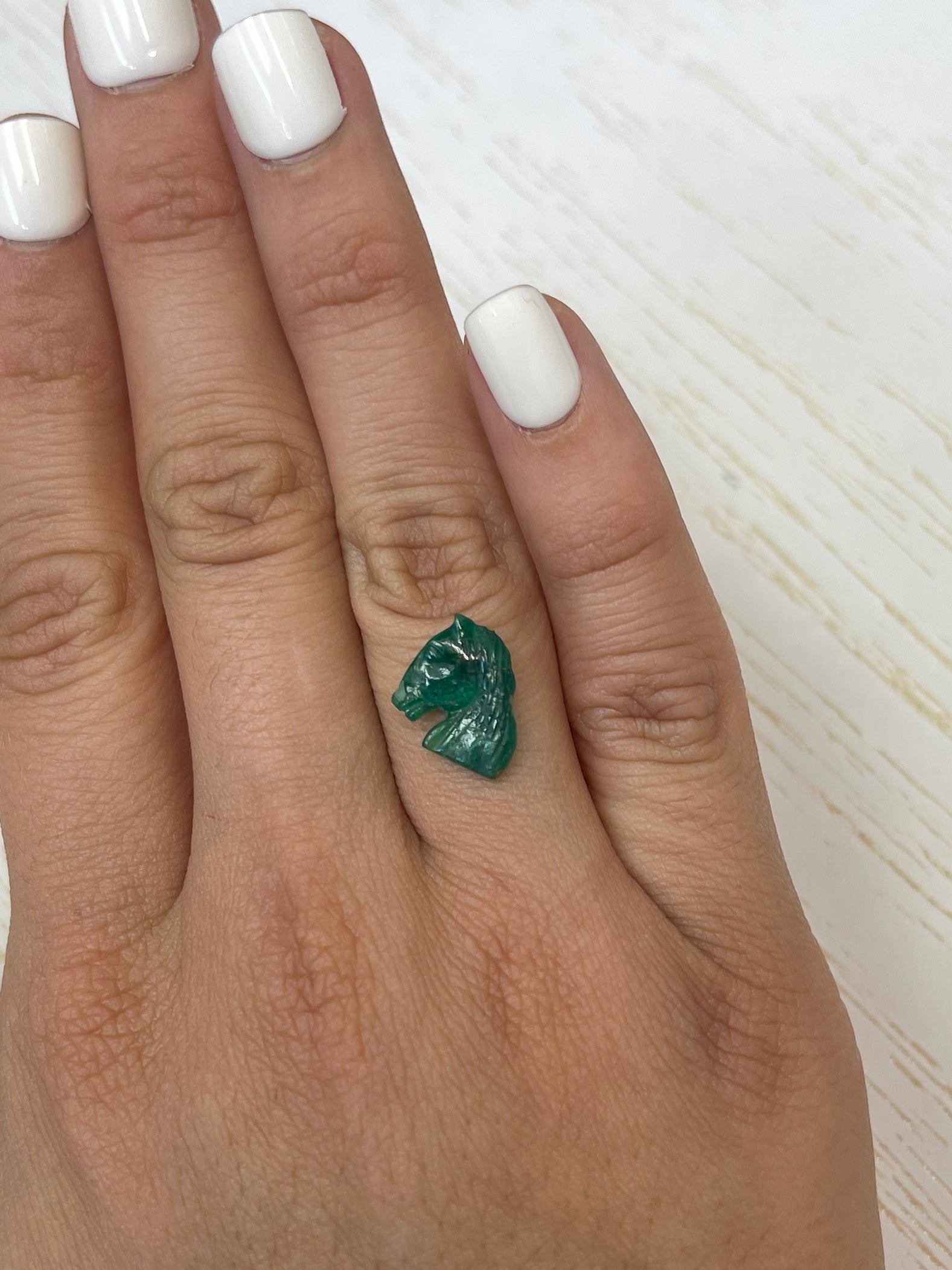 SEO-Friendly ALT Text for a Stunning 3.42 Carat Emerald Horse Head