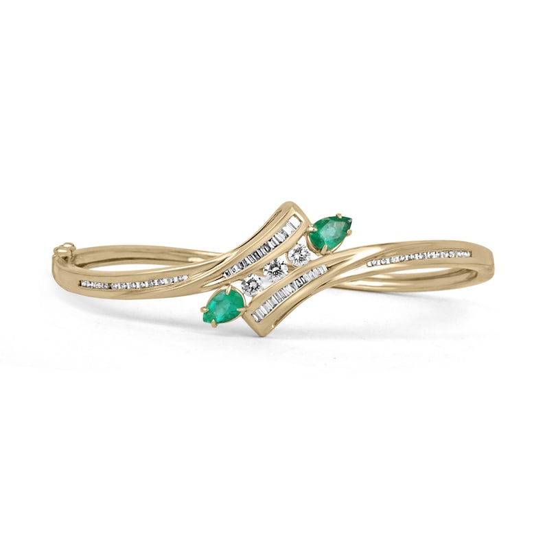14K yellowish green emerald bangle bracelet with round cut emeralds and triple diamond accents, Colombian Emerald brand.
