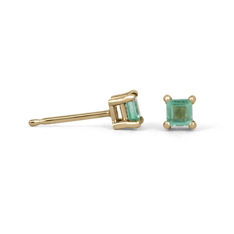 Natural Colombian emerald princess cut stud earrings, 0.45tcw, set in 14K gold, featuring petite baby size with Asscher cut brilliance.