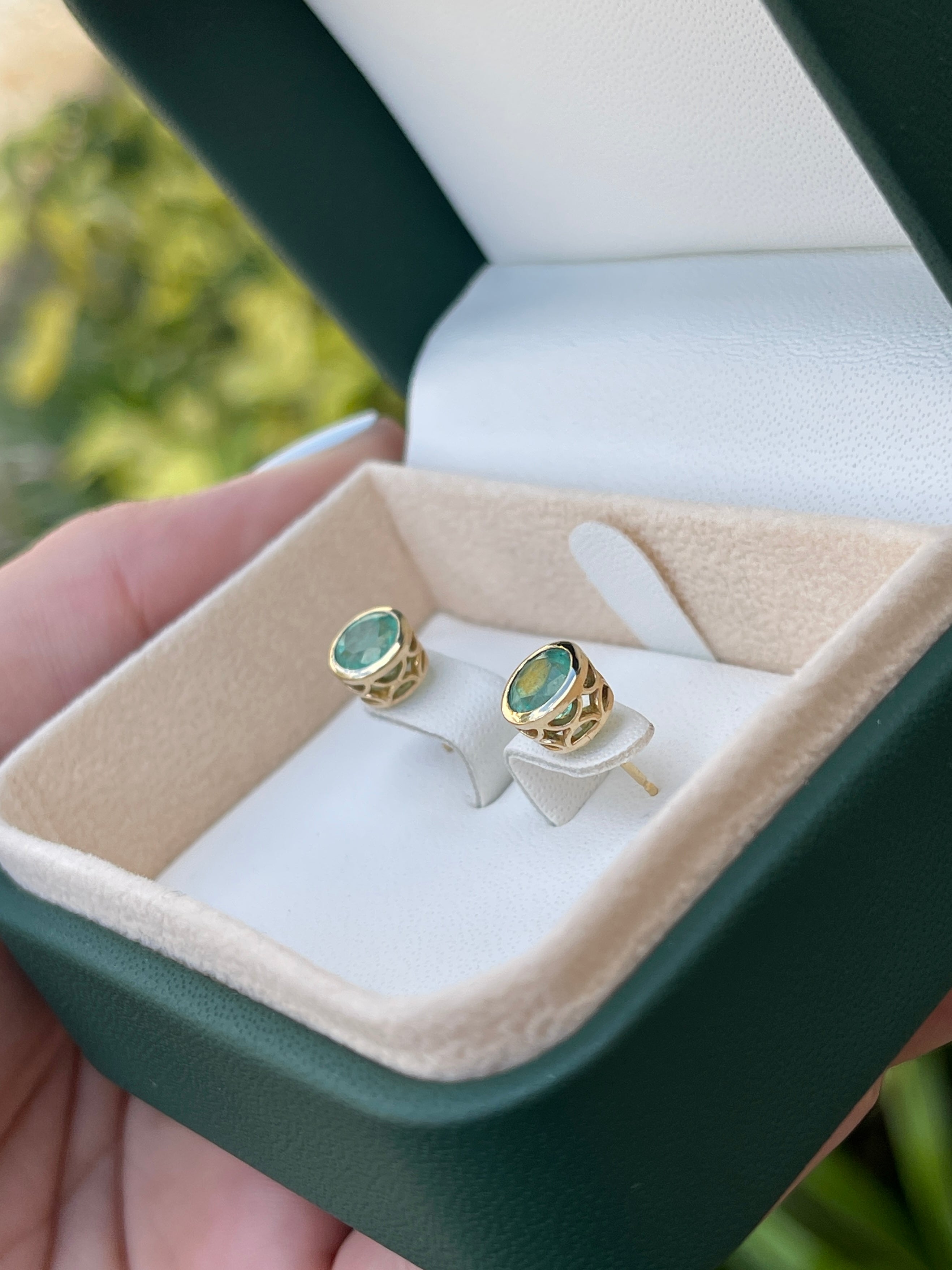 14K natural emerald round cut push back earrings featuring 1.60tcw from Colombian Emerald brand.
