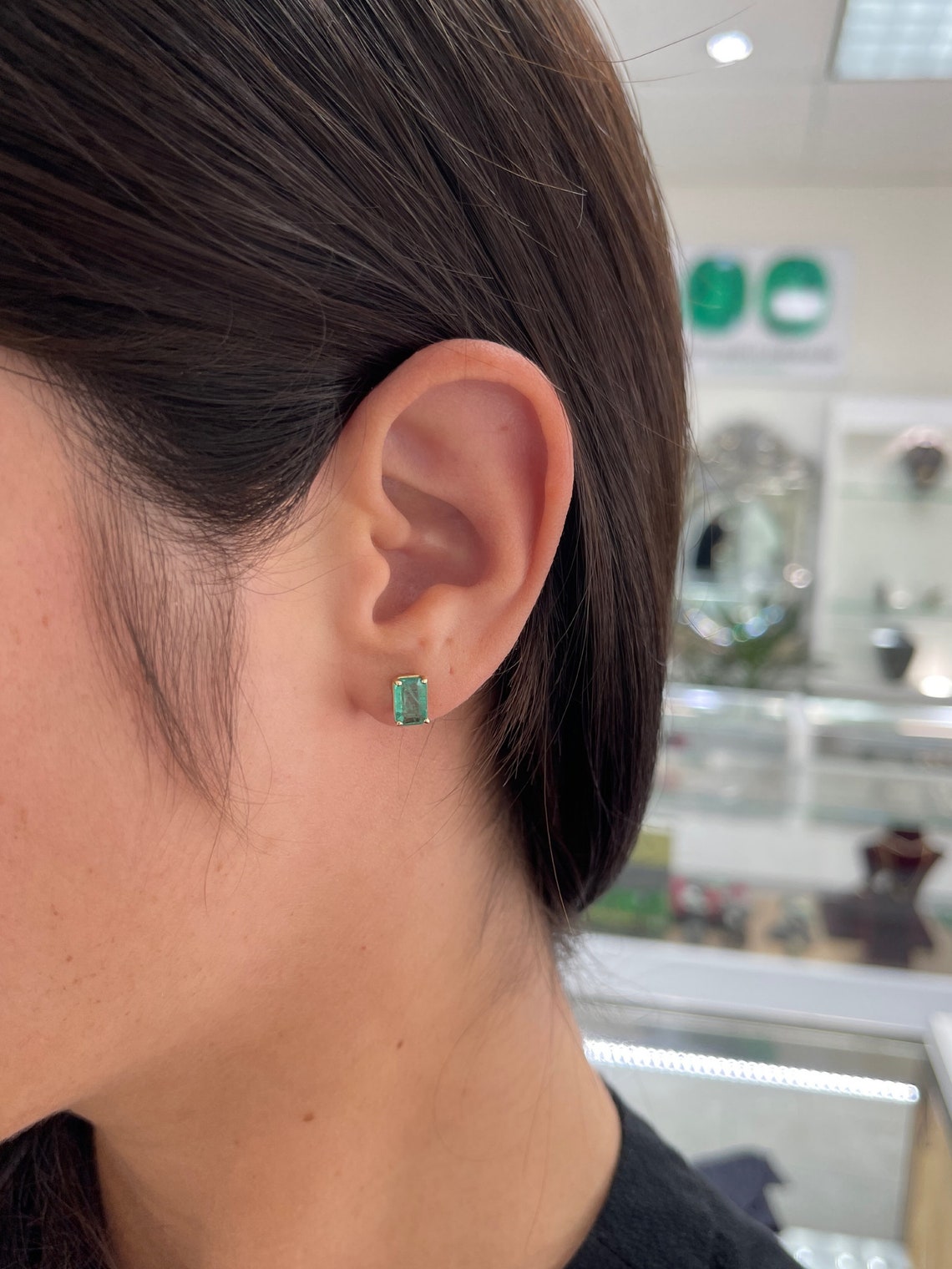 Colombian Emerald 14K gold May birthstone stud earrings with 1.81tcw emerald cut natural emerald gemstones.