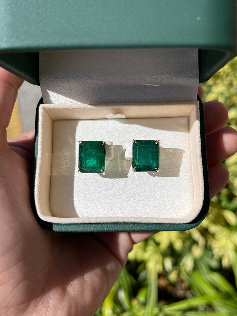 Large 18K gold earrings with 18.04 tcw AAA Colombian emerald studs, featuring a statement heirloom design.