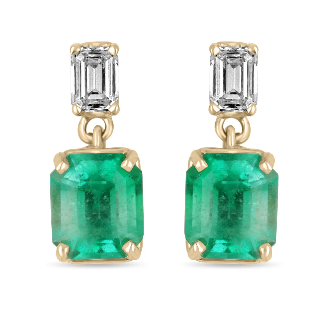 Elegant elongated emerald and diamond dangle earrings in 18K gold, featuring natural transparent Colombian emeralds and sparkling diamonds.