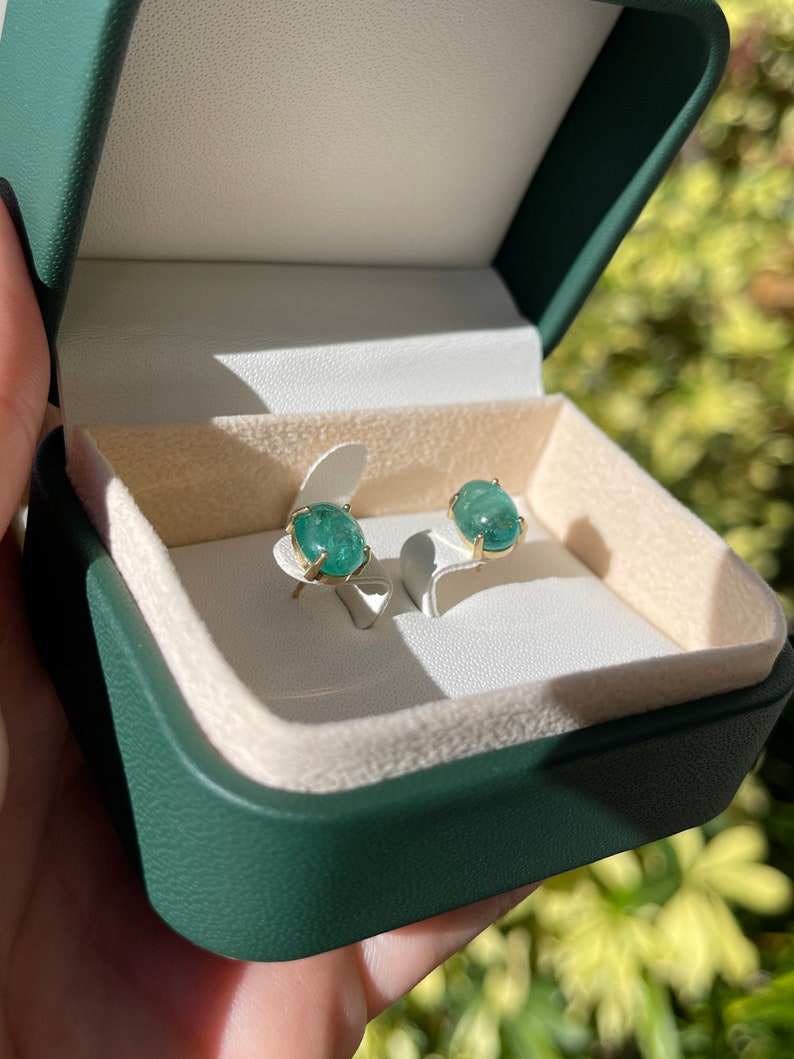 Colombian Emerald earrings with 4.34 carats of oval cut deep bluish green natural emeralds in 14K setting
