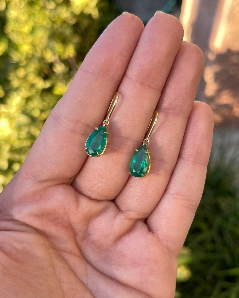 Natural dark green teardrop emerald dangle earrings with 5.0tcw 18K gold hooks by Colombian Emerald, showcasing elegant gemstone jewelry.