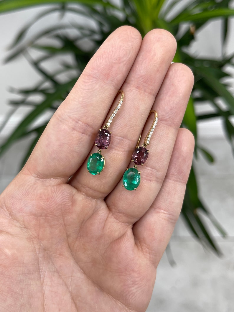 Luxurious 18K green emerald spinel and pave diamond accent dangle earrings featuring Colombian Emerald brand design.