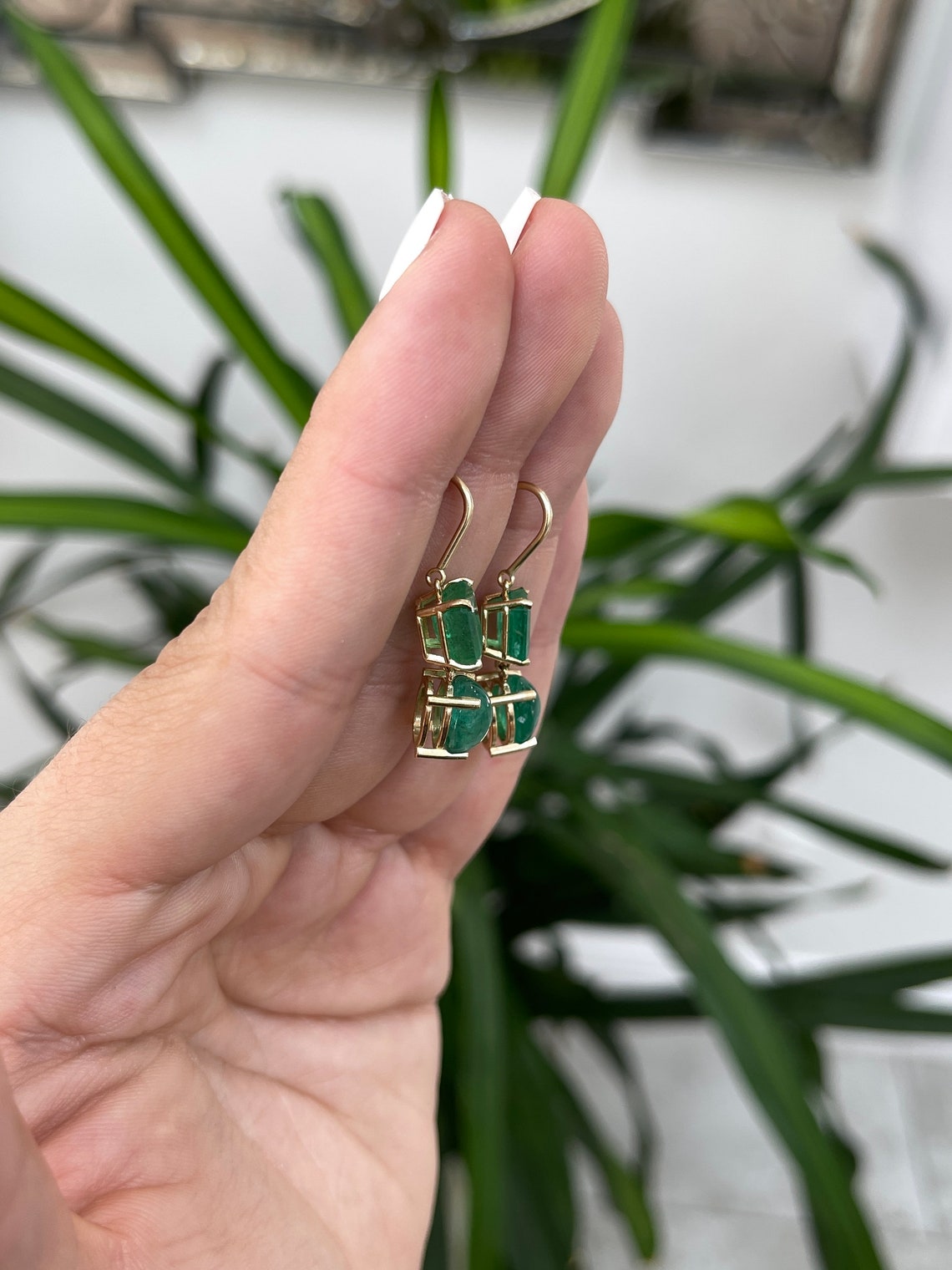 Colombian Emerald 8.45tcw forest green cut and cabochon dangle drop earrings in 14K gold, showcasing elegant gemstone design.