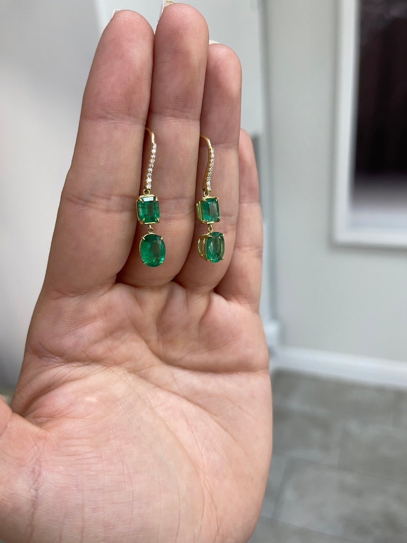 Colombian Emerald earrings with dark green emeralds and diamond accents, 18K gold dangle earrings with fine quality craftsmanship.