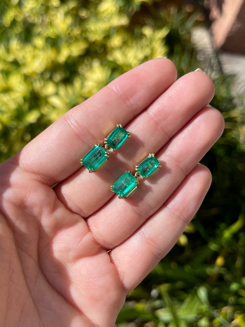 Vivid green Colombian Emerald dangle earrings in 18K yellow gold with AAA+ 8.93tcw gemstones, crafted by Colombian Emerald.