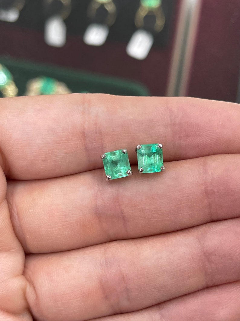 Blue and green Colombian Emerald Asscher earrings featuring 3.58 carats in 14K gold with intricate detailing.
