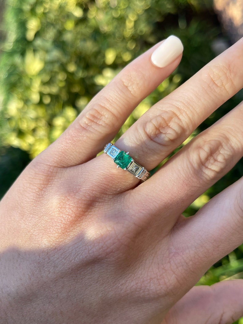 Colombian Emerald 3-stone engagement ring with 1.20tcw Asscher and princess cut diamonds in 18K gold setting