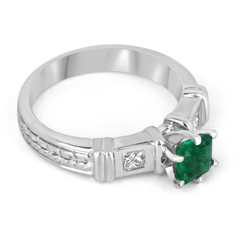 Colombian Emerald 3-stone engagement ring with 1.20tcw Asscher and Princess cut diamonds, set in 18K gold.