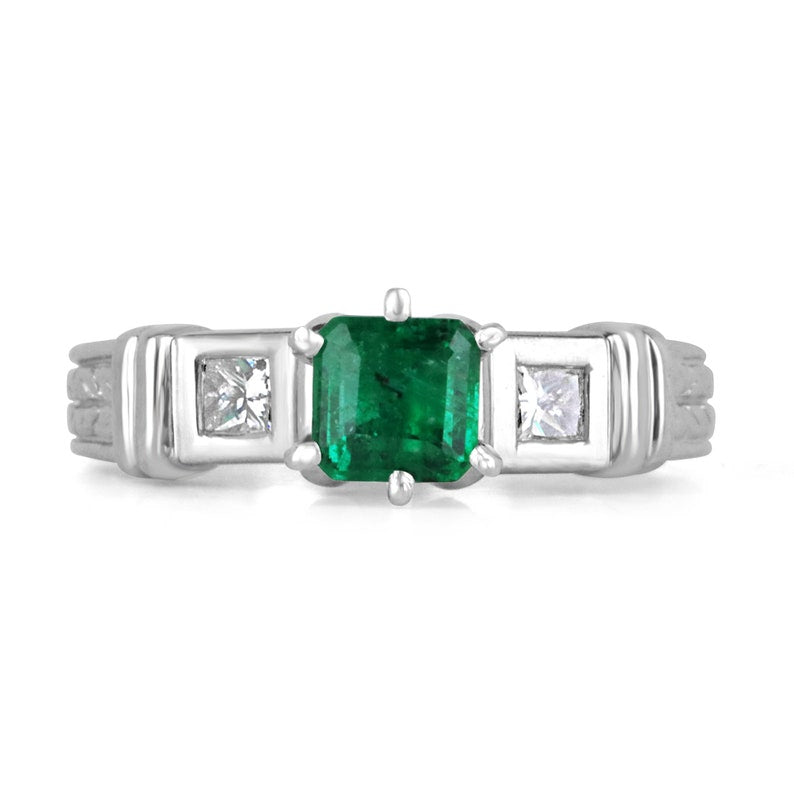 Colombian Emerald 3-stone engagement ring featuring 1.20tcw Asscher and Princess cut diamonds on 18K gold setting.