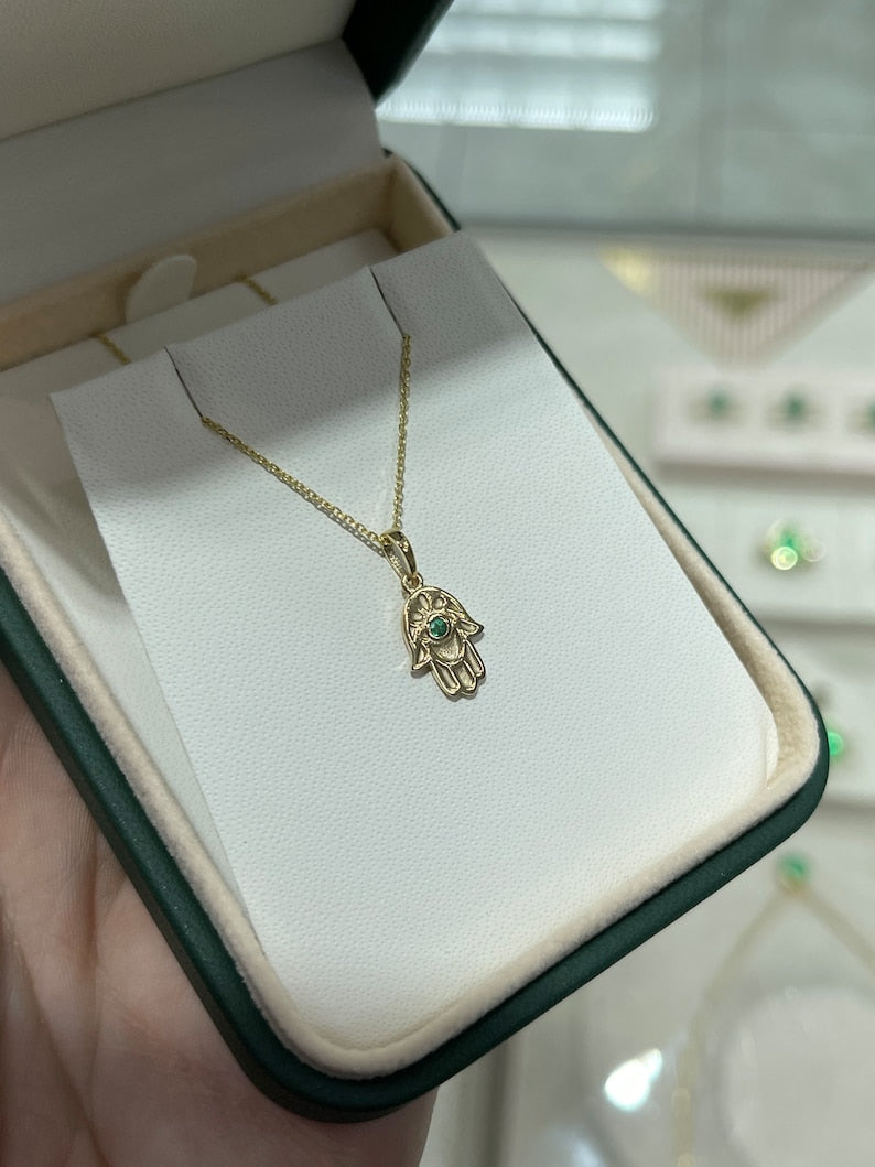 Natural 0.07-carat Colombian emerald Hamsa pendant necklace in 14K white gold, featuring Jewish and Muslim religious symbols.