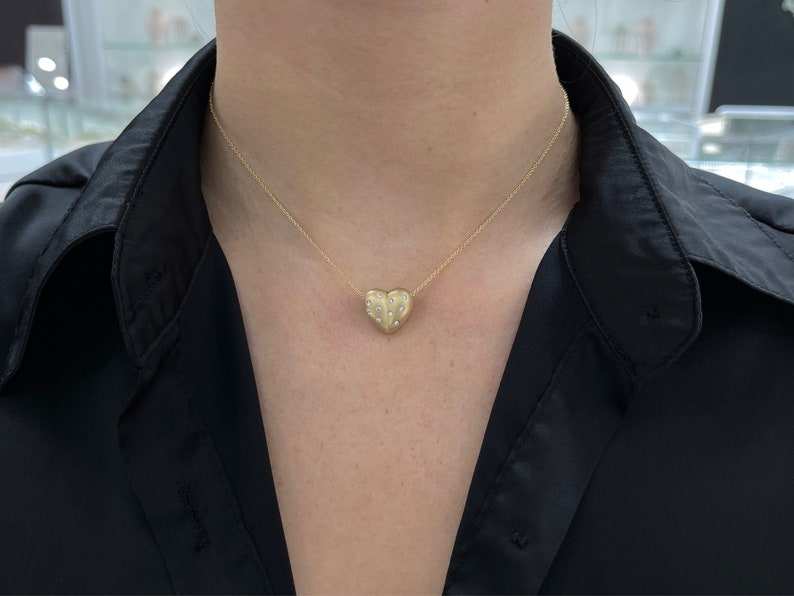 14K gold anniversary slider necklace with 0.30ctw 3D pave diamond heart pendant, featuring a bubbly, puffed design from Colombian Emerald.