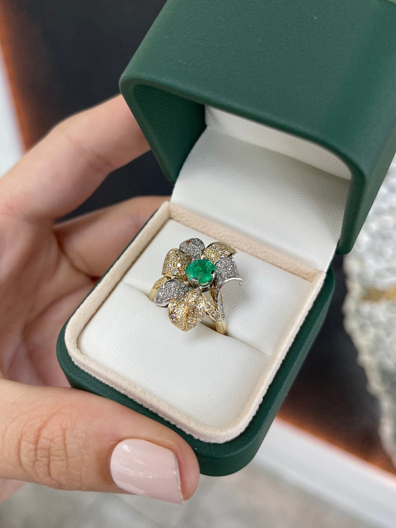 Ladies Colombian Emerald and Diamond Leaf Cluster Cocktail Ring featuring 1.75tcw 14K gold, round cut floral design.