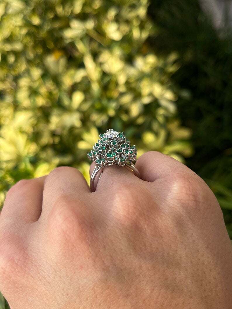 Ladies emerald cluster ring featuring 3.38tcw diamonds and emeralds in 14K white gold, showcasing a teardrop design.