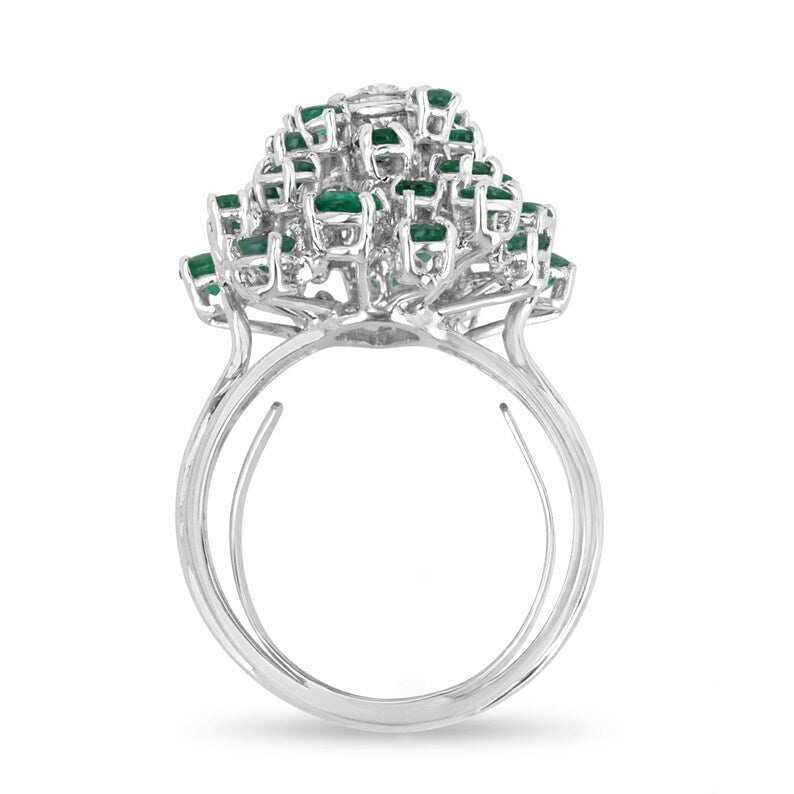 Ladies emerald cluster ring featuring 3.38tcw diamonds and emeralds set in 14K white gold, elegant teardrop design.