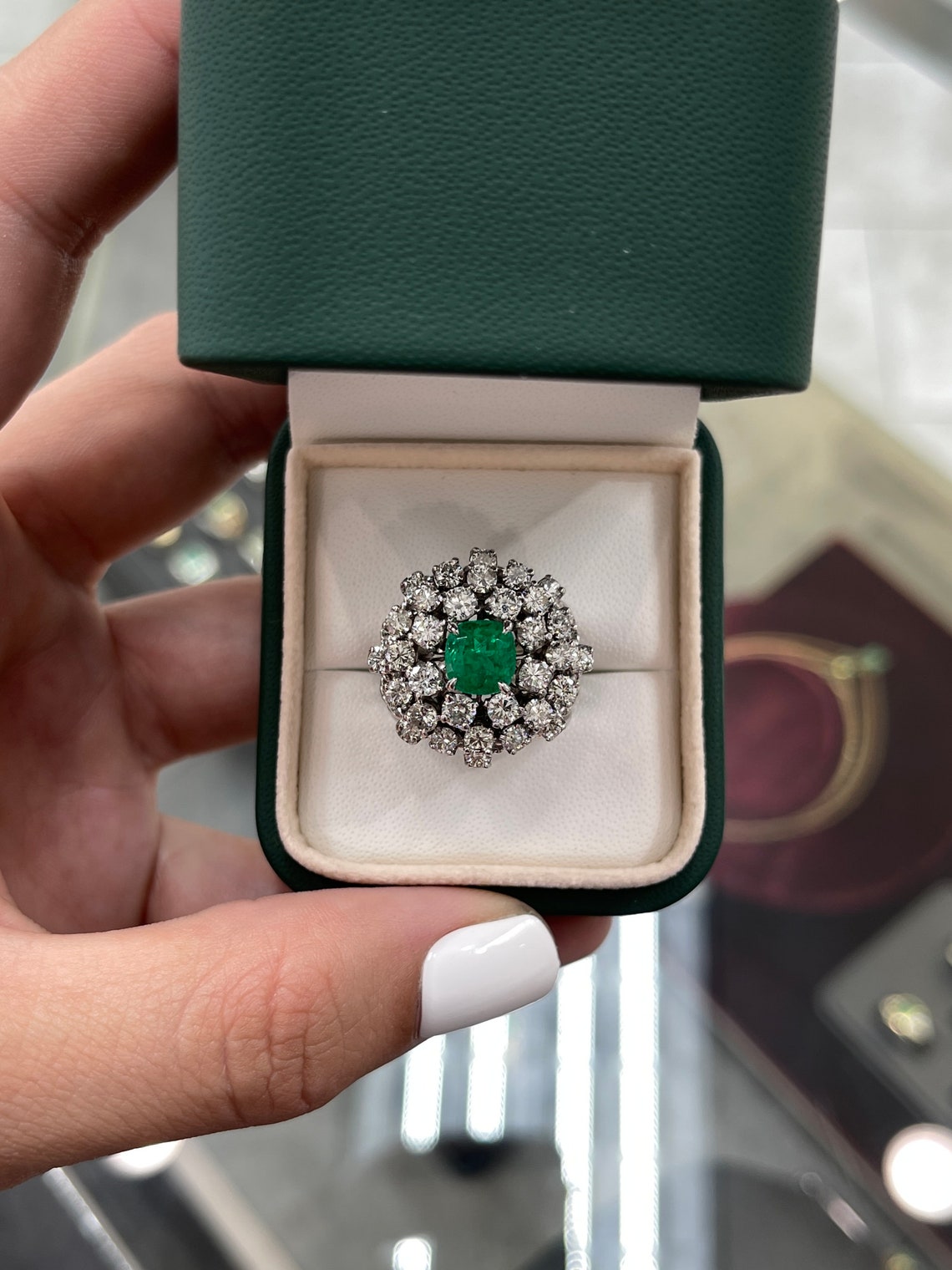 Colombian Emerald Ladies Ring with 5.0tcw cushion-cut emerald and diamonds in white gold vintage cocktail style.