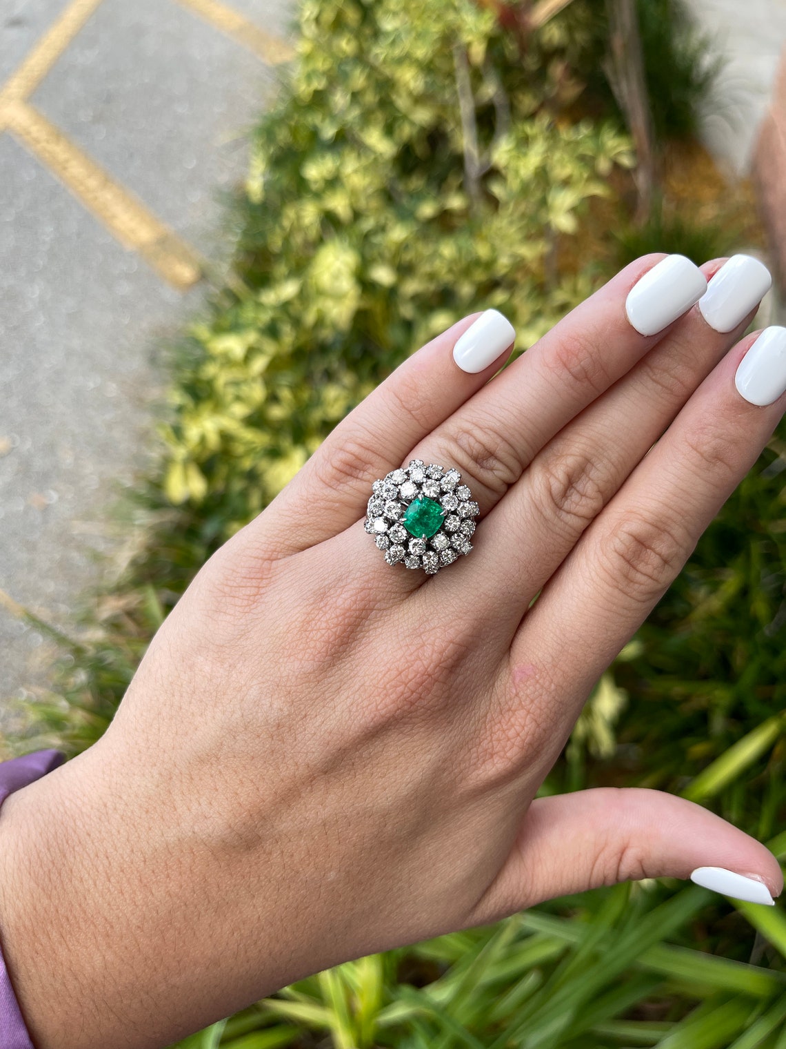 Colombian Emerald Ladies Ring with 5.0tcw cushion-cut emerald and diamonds in a vintage white gold statement design.
