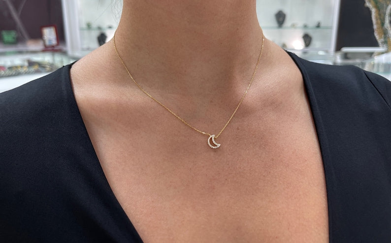 14K gold diamond crescent cable chain necklace with 0.20tcw natural diamonds, featuring an open moon shape by Colombian Emerald.