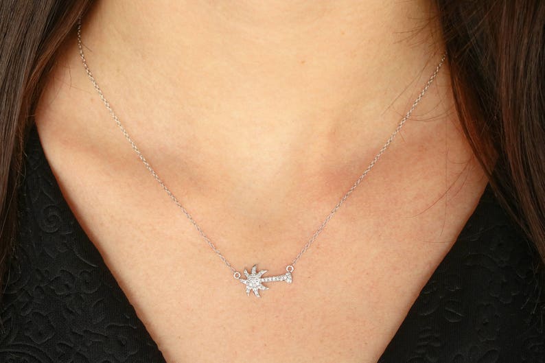 14K gold pendant necklace with a 0.25 carat natural diamond palm tree design from Colombian Emerald.