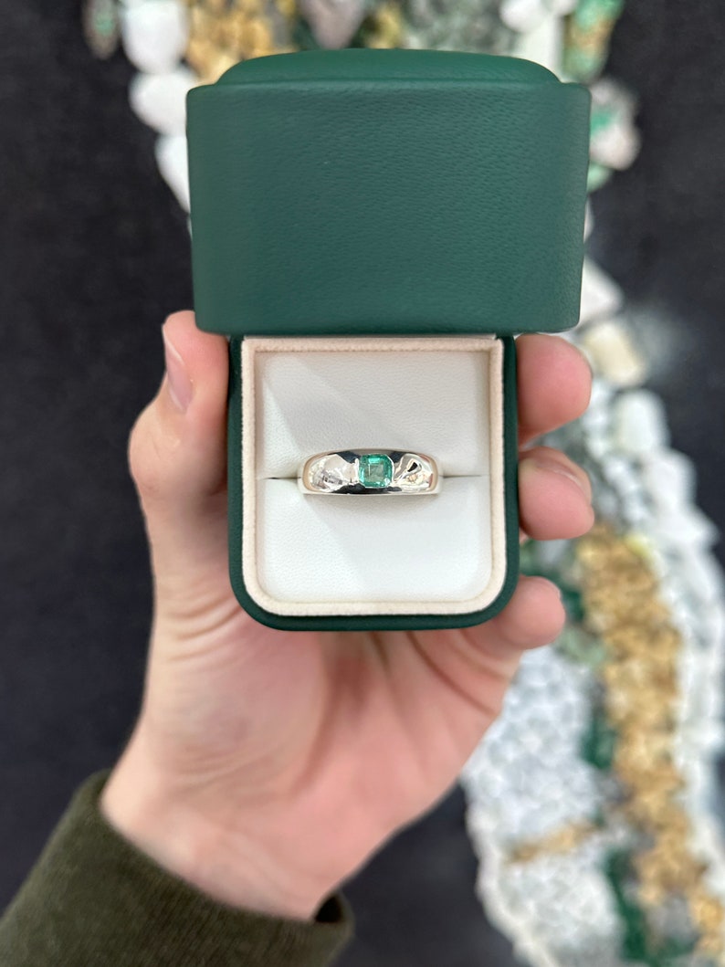 Unisex sterling silver pinky ring with 0.95 carat Asscher cut emerald bezel-set solitaire by Colombian Emerald.