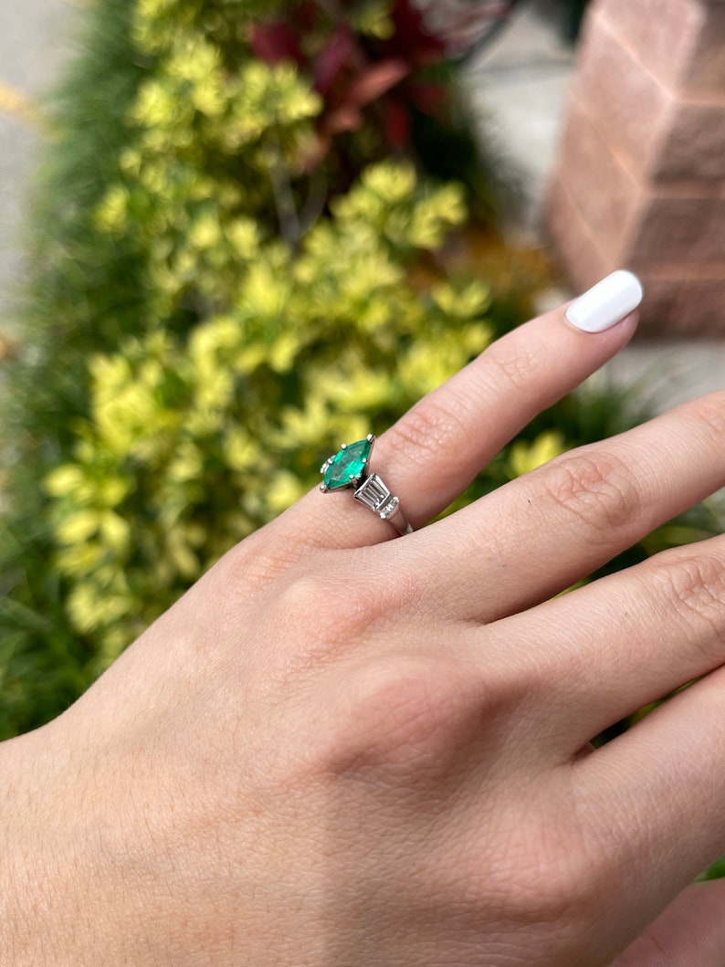 14K Colombian Emerald and Diamond Ring featuring marquise cut emerald and tapered baguette diamonds, elegant jewelry for special occasions