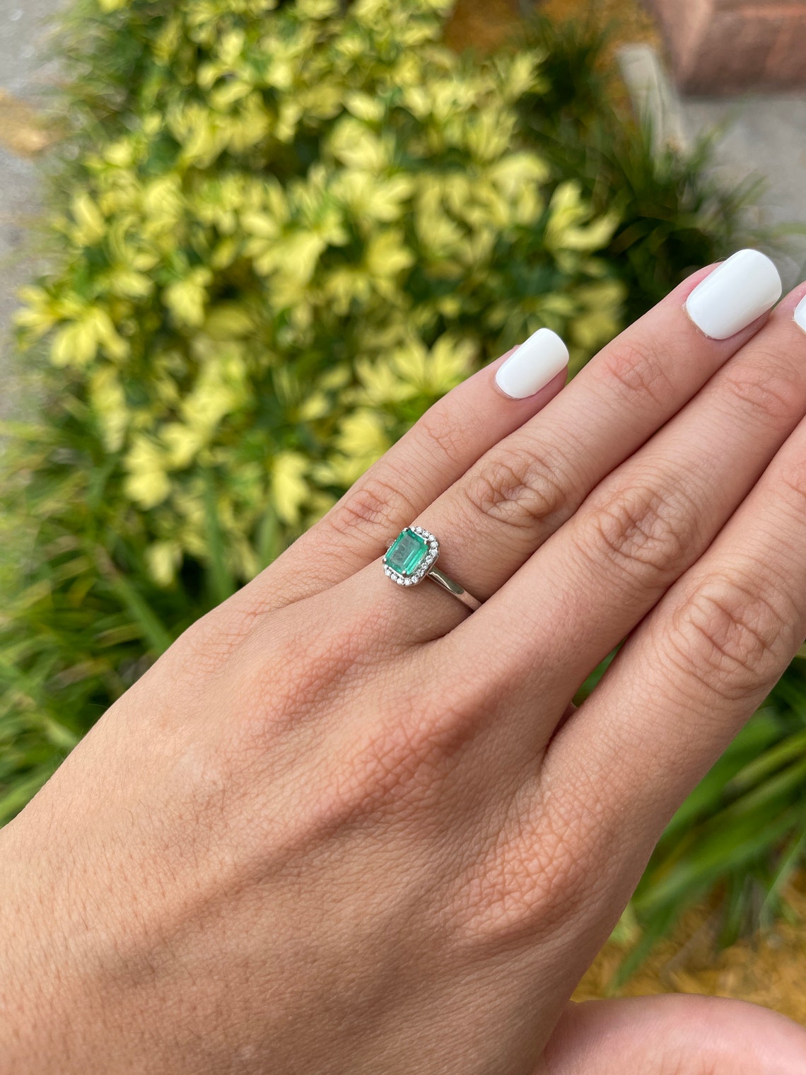 Colombian Emerald natural engagement ring with 1.21tcw emerald cut emerald and diamond halo in 14K gold setting