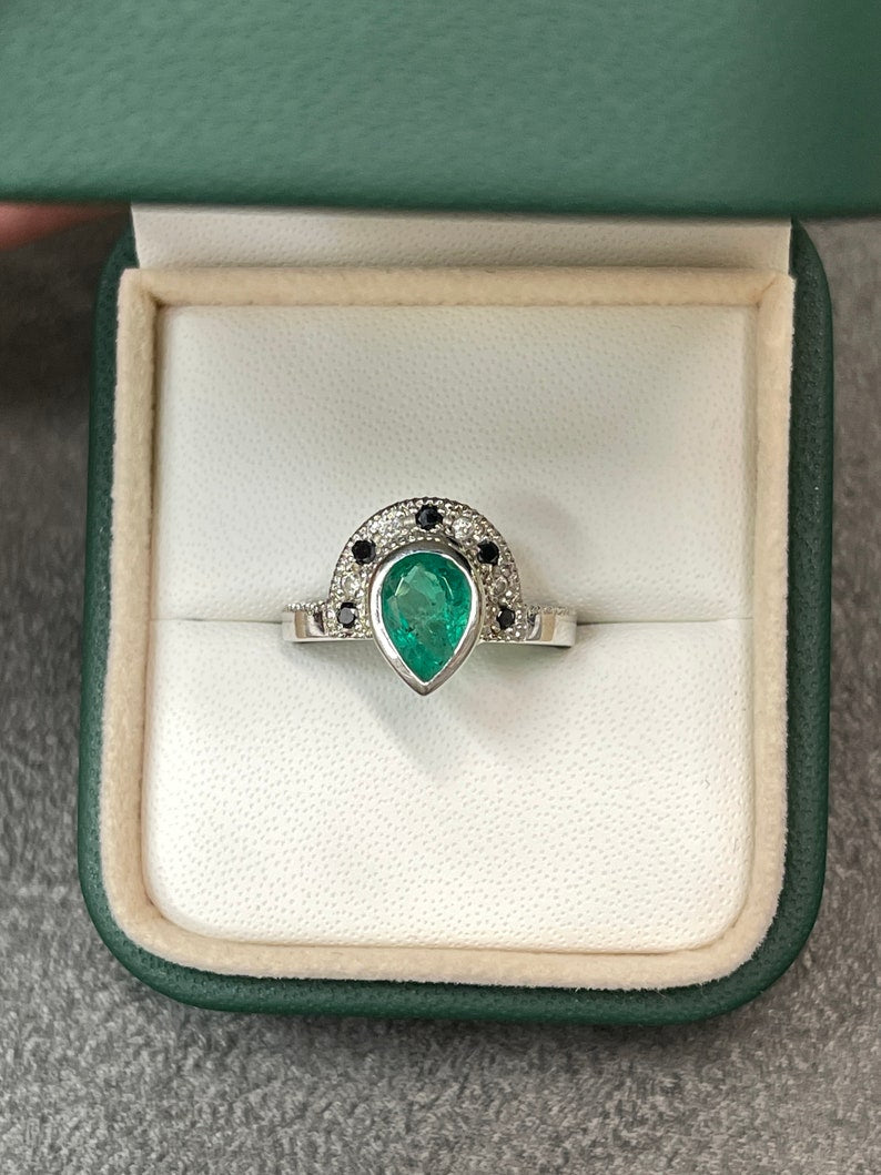 14K emerald pear cut black diamond ring with tiara design, featuring 1.63 tcw from Colombian Emerald jewelry collection.