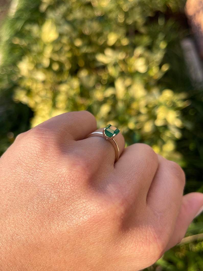 14K gold Colombian emerald solitaire ring with 2.10cts natural emerald and 4-prong setting, designed for right hand wear.