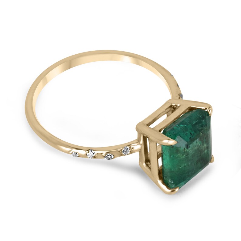 Dark emerald and diamond accent engagement ring in 14K gold, featuring 2.68 carats from Colombian Emerald brand.