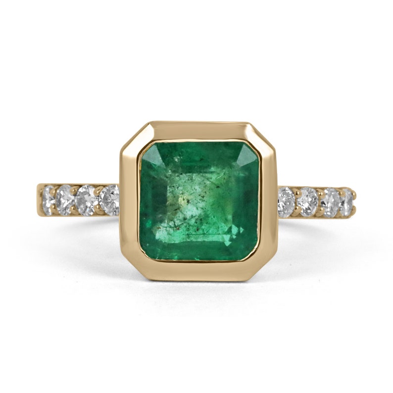 14K gold square emerald bezel set ring with Asscher cut emerald and diamond accents, designed as a right-hand solitaire ring.
