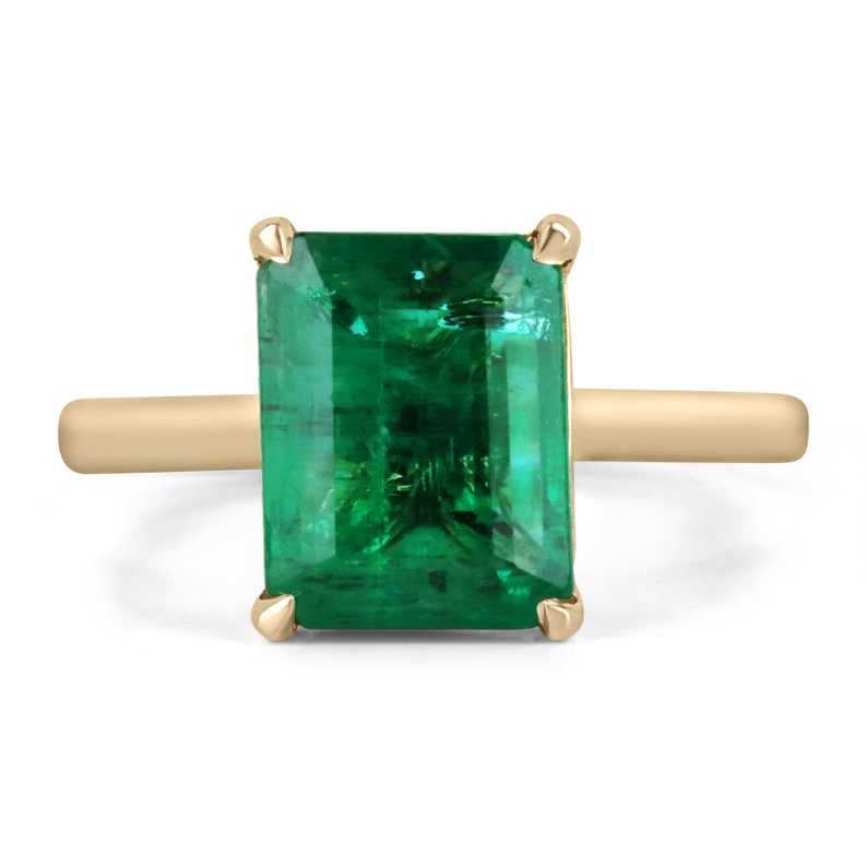 18K gold emerald cut solitaire engagement ring with 3.84 carat Colombian emerald for a classic elegant look
