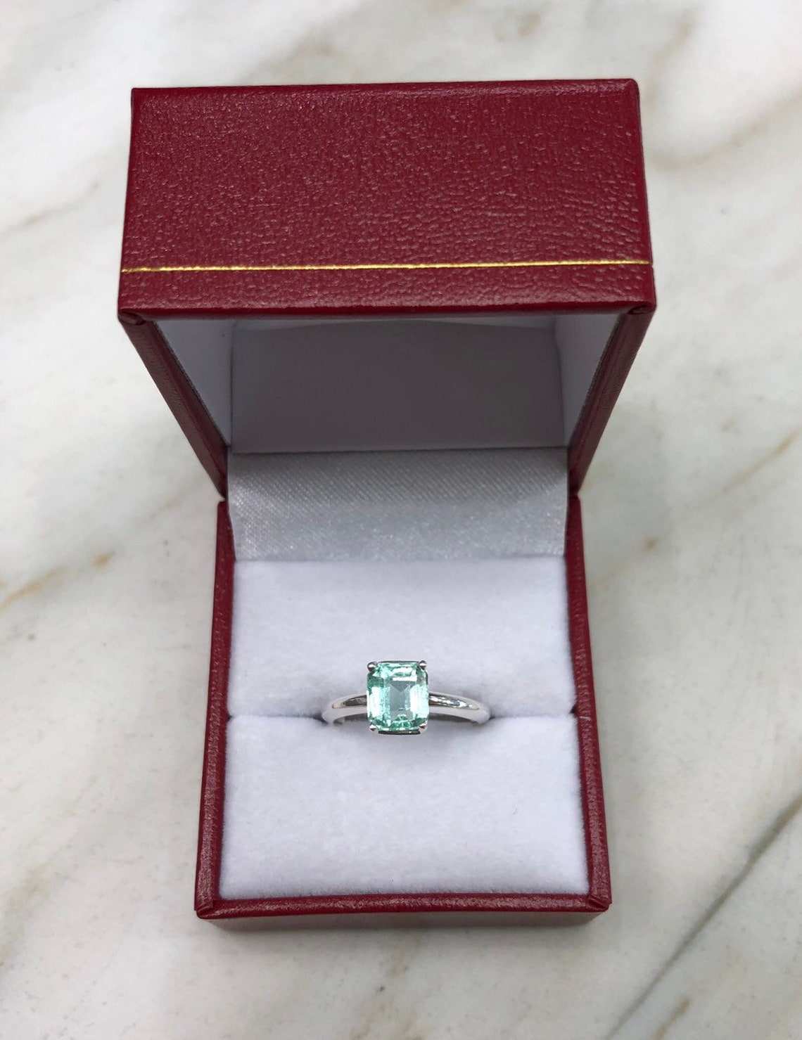 Emerald Solitaire Engagement Ring