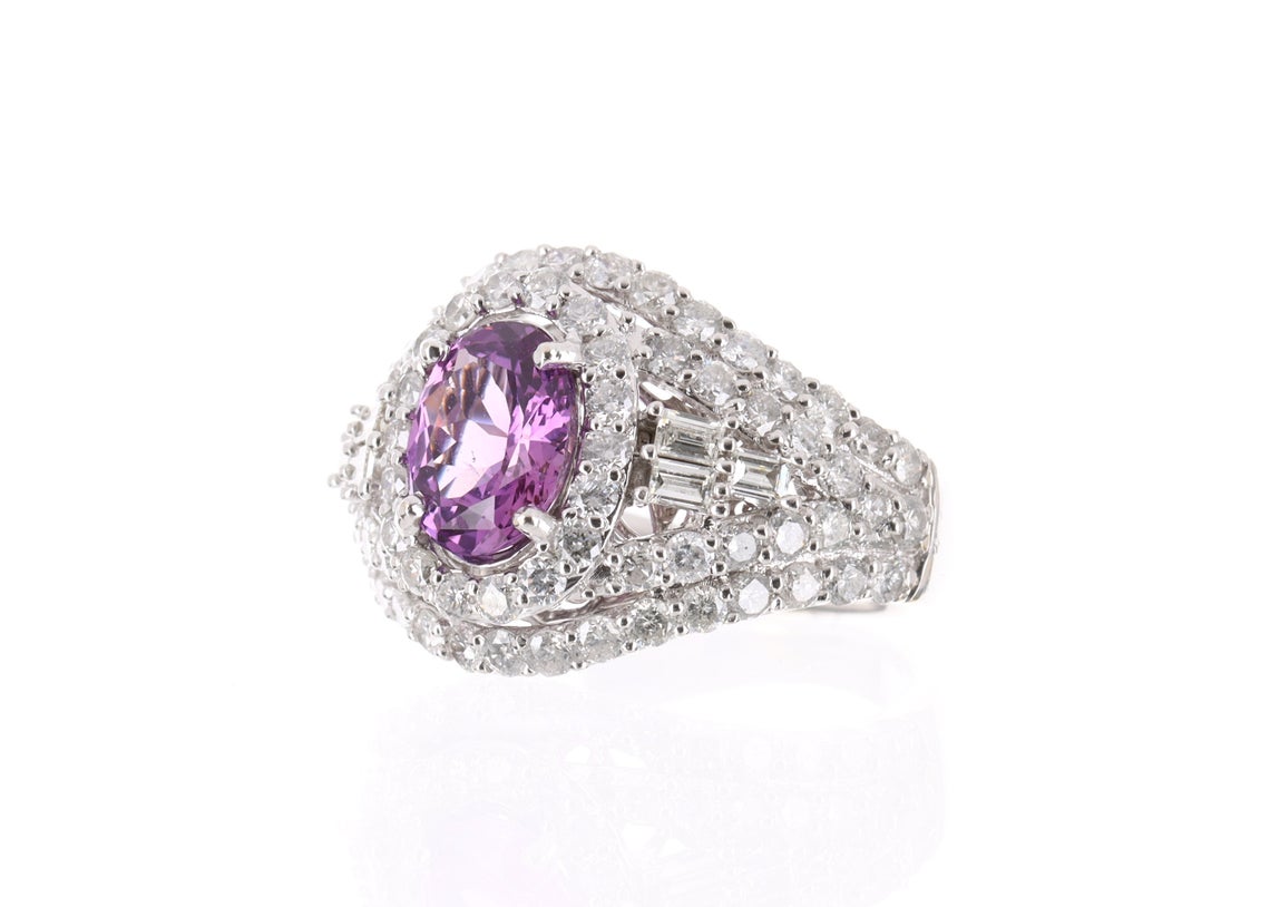 Vivid Pink Oval Sapphire & Diamond Halo