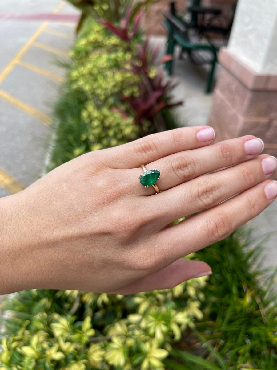 Celebrate Brilliance: 14K Gold Ring Featuring 2.10cts Pear Emerald Solitaire